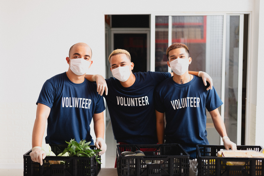 Volunteers with Crates of Food